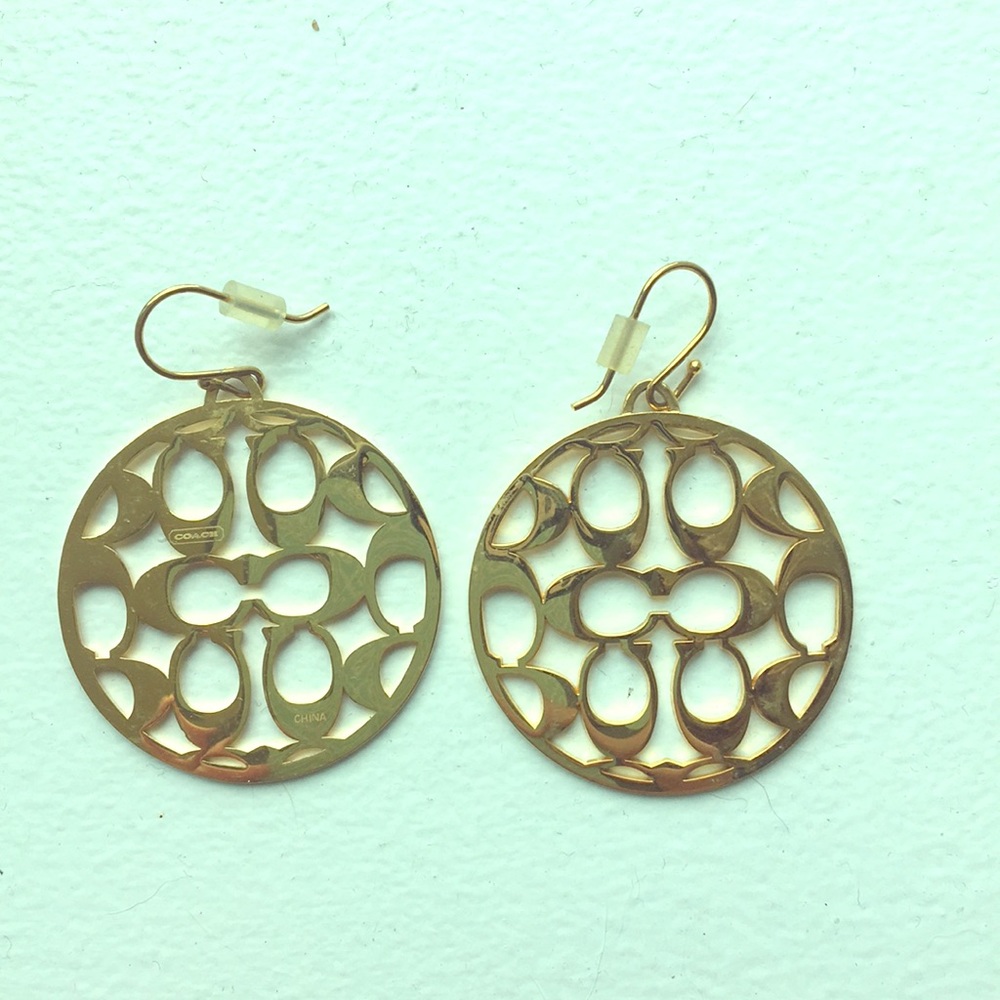 Gold signature COACH earrings